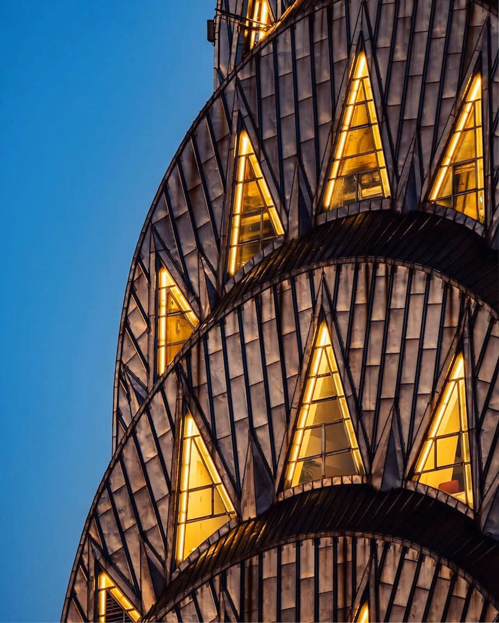 Chrysler Building crown close up photograph - Grand Central Partnership on Instagram: “Morning glow. | Photo by @ksmontoya vía @nyc_pictures”