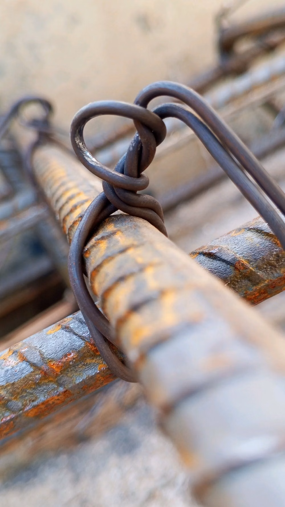 exposed rebar construction close up photograph -