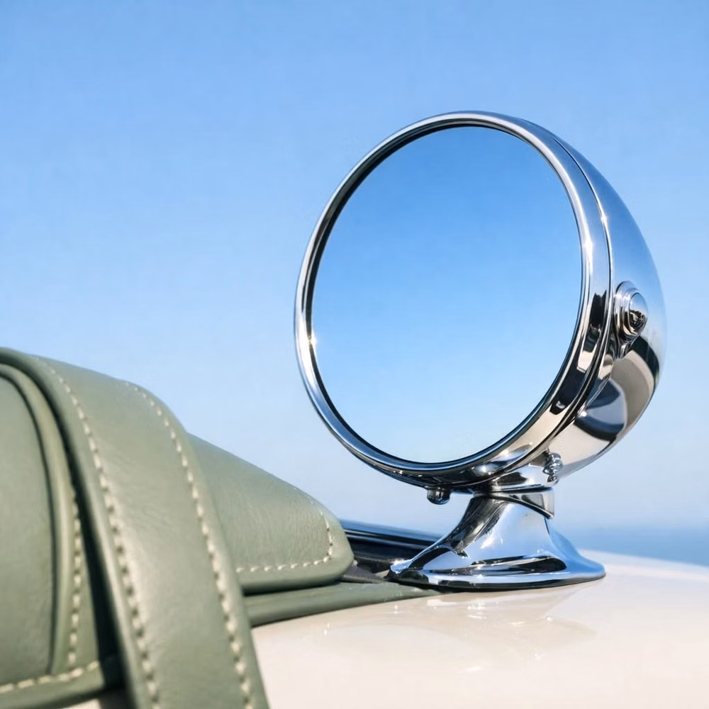 vintage chrome car bumper reflection close up - A nod to the past, moving towards the horizon. The allure of the open road, captured in a single, silent reflection.  Explore the collection: www.lestylenu.com/room-fragrances  #LeStylenu #QuietLuxury #VintageMotion #SkyBlue