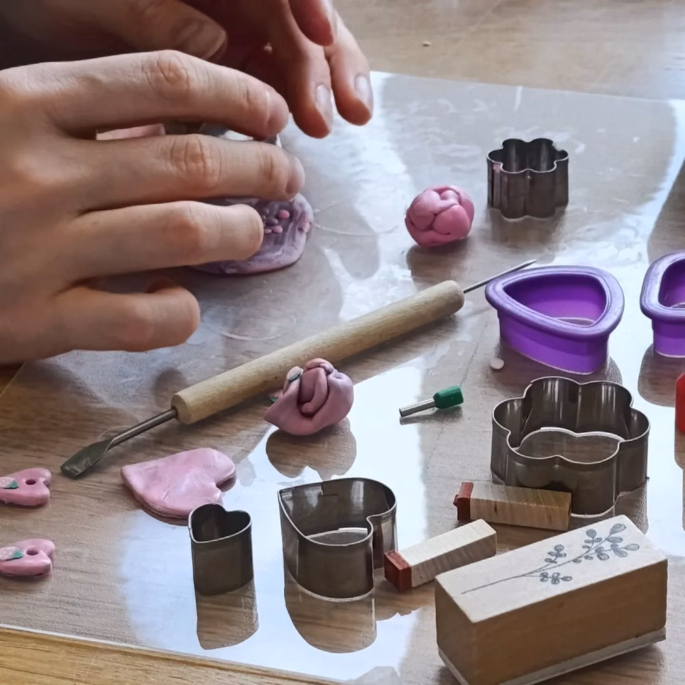 colorful clay modeling tools overhead photograph - Polimer clay jewellery workshop! 🩷  Last Sunday I gave my very first Polimer clay workshop. It was quite special for me as Polimer clay has been a medium I've been coming back to since childhood. Some of my very first jewellery pieces were made out of it and I love the endless possibilities and ways to work with it.   Thank you to my lovely participants for spending the moody autumn Sunday morning with me! 🤗✨  Would you like to try working with Polimer clay? 😁💕