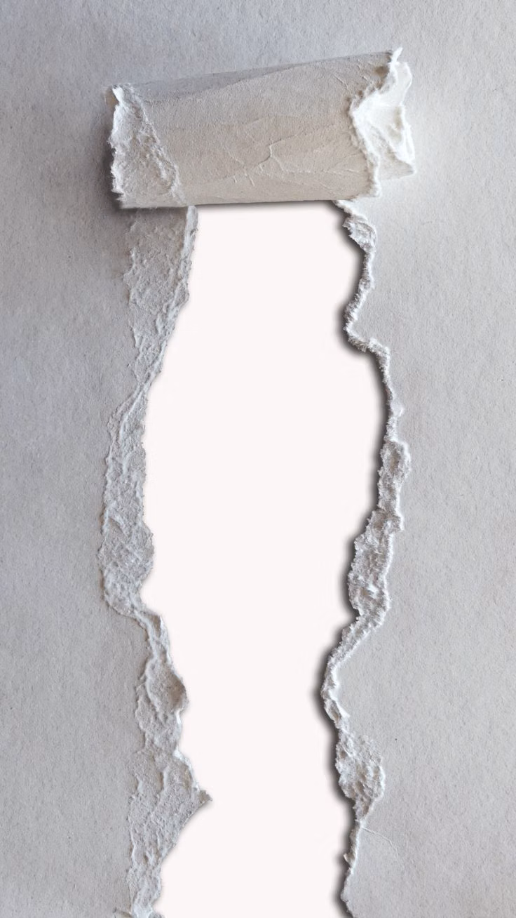 torn paper edges layered macro photograph -
