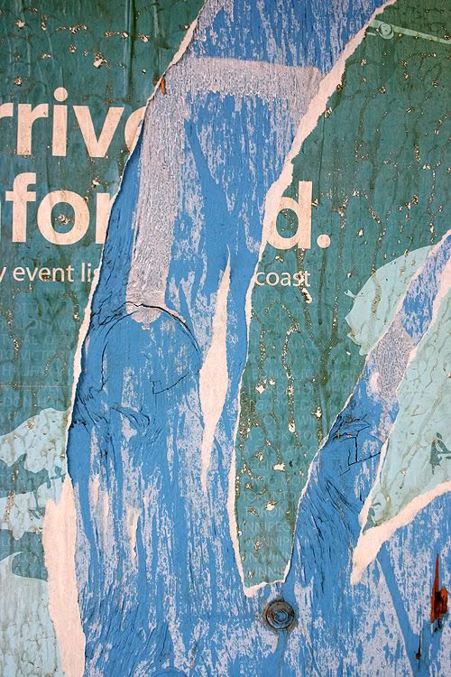 torn layered street posters texture photograph - Torn poster