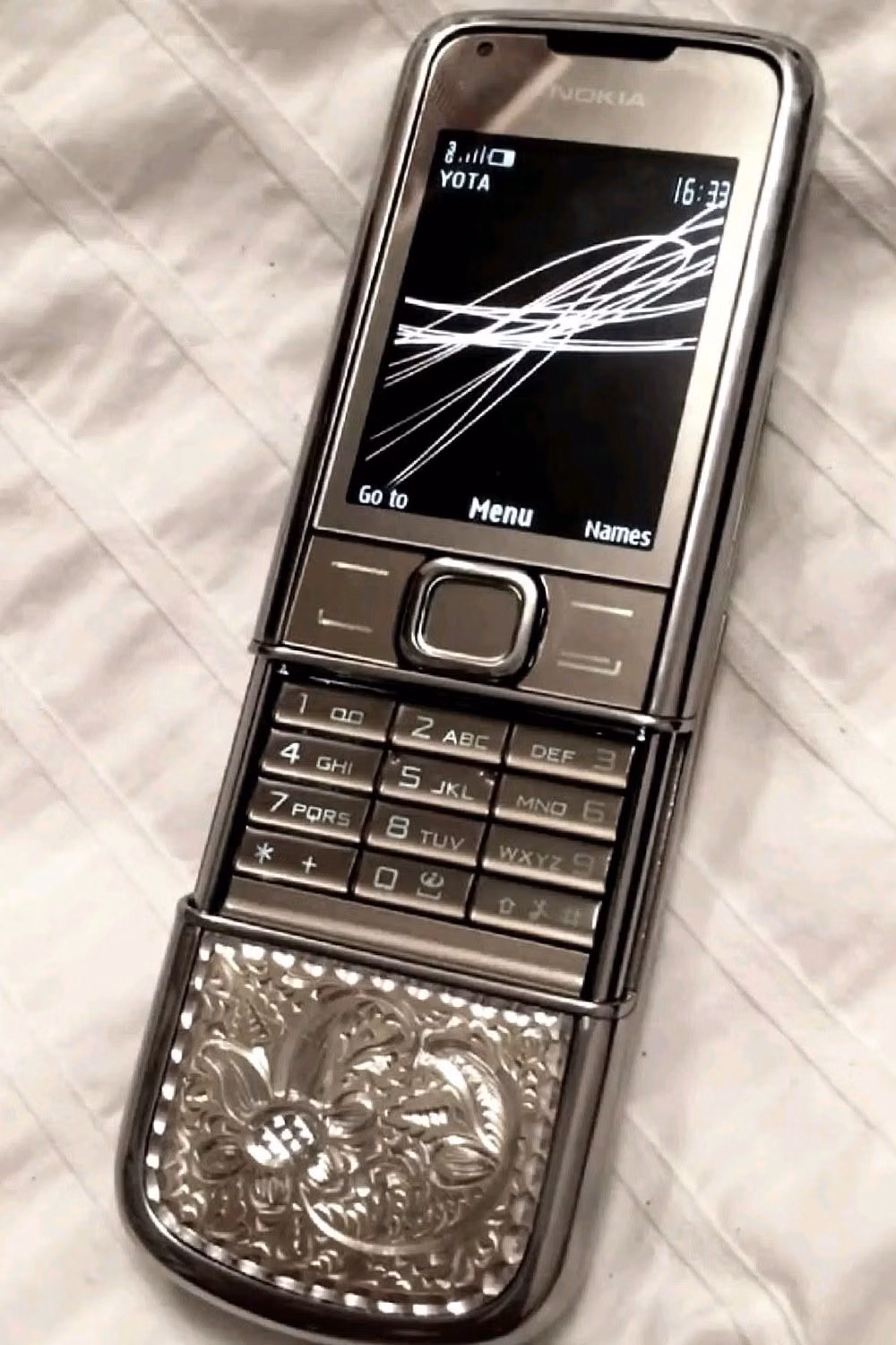 silver flip phone product photograph - ˚ casey lordan - boys of tommen