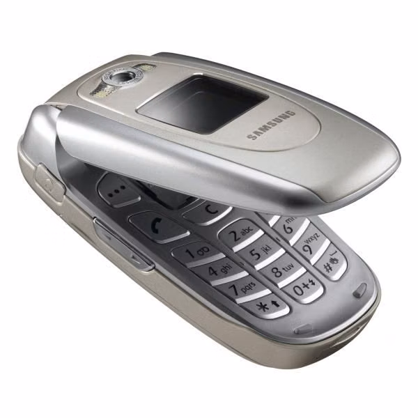 silver flip phone product photograph - Cool phone, my third I think.