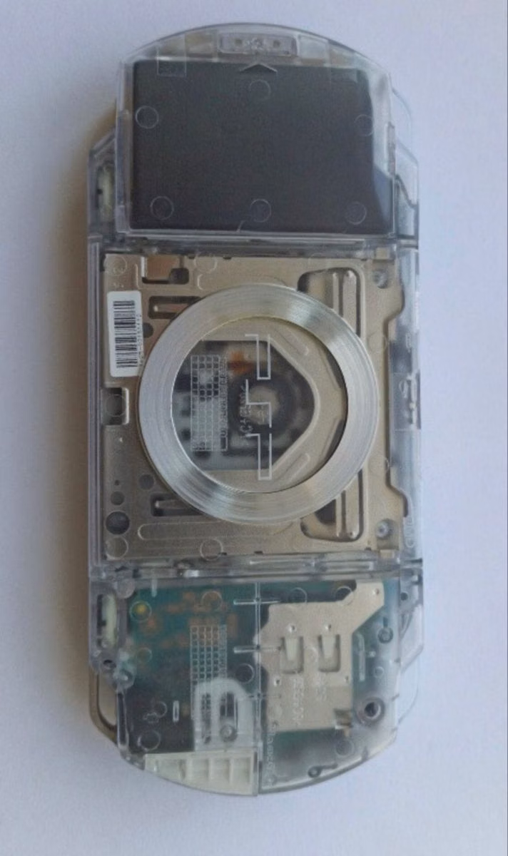clear plastic electronic device close up photograph - 