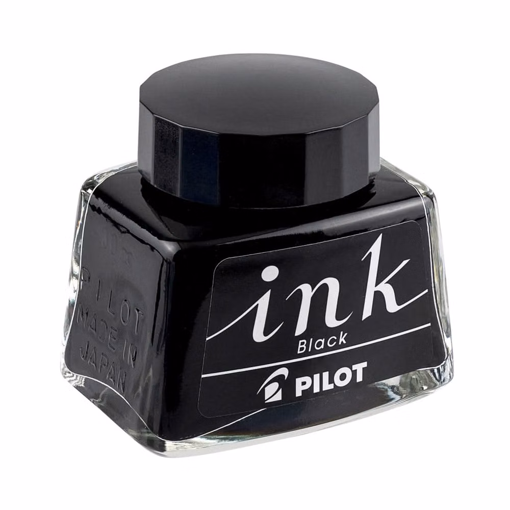 black fountain pen ink manuscript photograph - The Pilot Signature 30ml Ink Bottle is a reliable, high-quality ink designed for smooth, consistent writing with all Pilot and Namiki fountain pens, offering easy refills and a well-behaved formula that resists clogging and drying. 
It is available in 3 colours and supports both cartridge and converter filling systems, making it a versatile choice for everyday use.
Ideal for Daily Use
The Pilot Signature ink is engineered for dependable performance, delivering a smooth flow that suits regular writing tasks without skipping or hard starts.
Its water-based formula ensures compatibility with a wide range of fountain pens, particularly excelling in Pilot models where it maintains consistent ink delivery. This makes it a practical choice for journaling, note-taking, or correspondence where reli