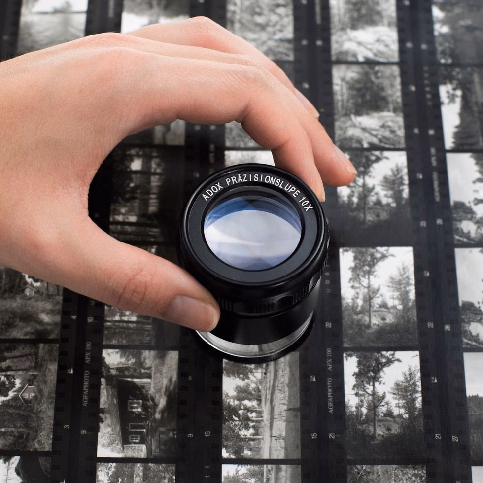 photographic contact sheet loupe photograph - Adox Fotowerke GmbH on Instagram: “Our new Adox Precision Loupe 10x. with a large covering area producing a crisp high quality image even in the edges. The foot is…”