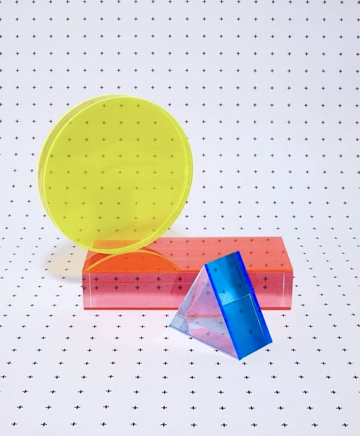translucent plastic geometric objects studio photograph - 