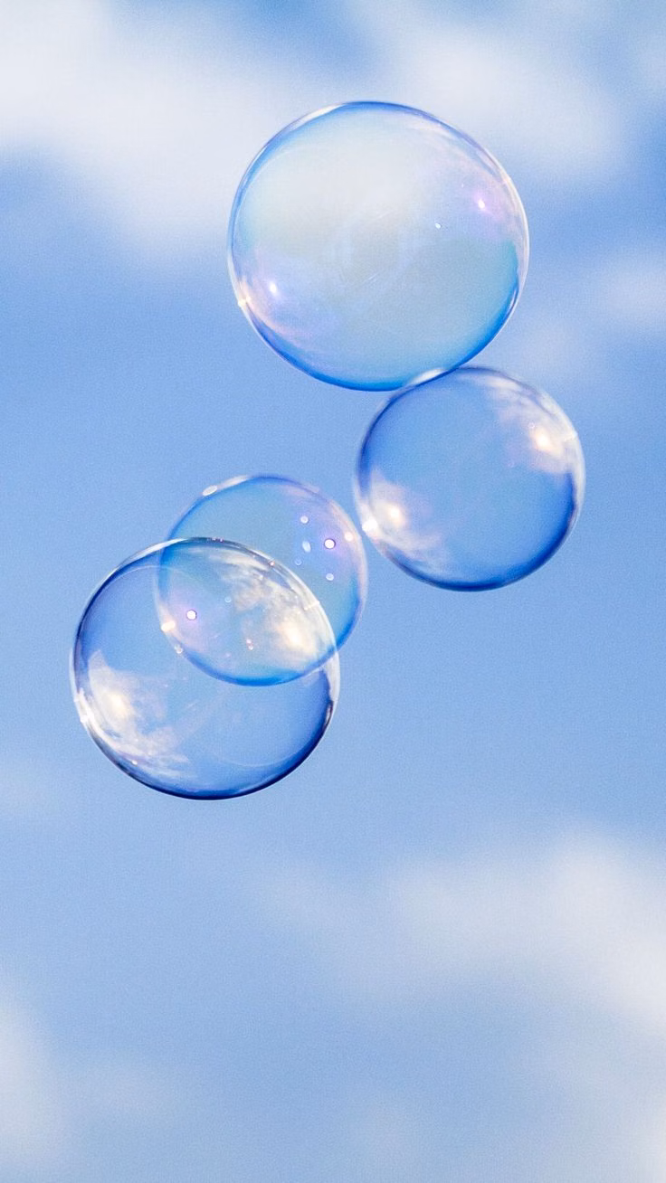 soap bubbles blue sky photograph - 