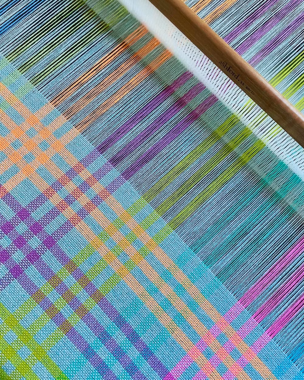 handwoven colorful textile loom photograph - New on the loom 🩷💛🩵 Pure cashmere  . . #handwoven #handwoventextiles #handweaving #handwovenscarf #cashmere #cashmerescarf #cashmereshawl #brightandbold