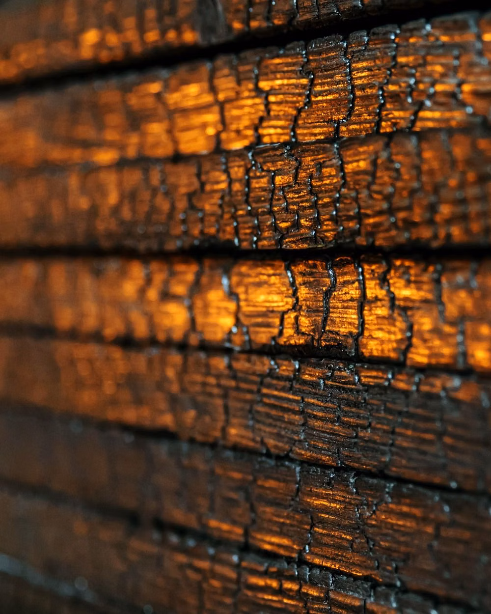 charred cedar yakisugi texture close up - Traditional technique, timeless beauty. #StudioTsukuru #Melbourne #Yakisugi #CharredWood #WoodTexture #ArchitecturalDetail #SustainableMaterial #TraditionalTechnique #MaterialArt #DesignDetail