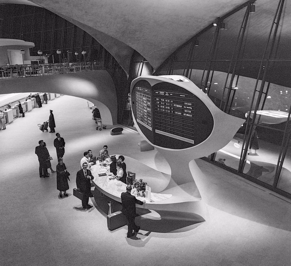 1960s airport terminal architecture photograph - TWA terminal at Idlewild, early 1960s.