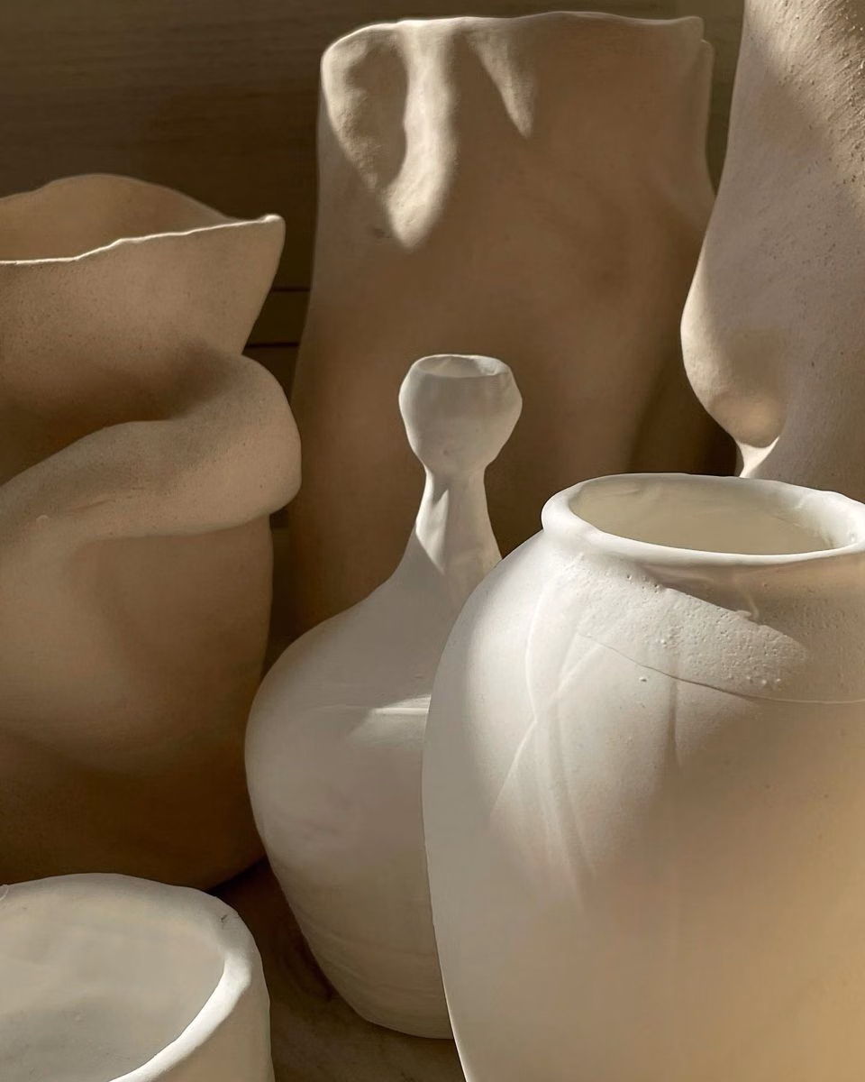 unglazed neutral ceramic pottery studio photograph -