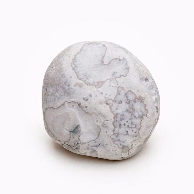 single stone on sand minimal photograph - Rob Whitworth on Instagram: "The Smaller Bigger Picture 32.

Art in nature. Beach finds. The beauty of nature. Beach pebbles. Beach stones. British beaches. Close up photography. Found objects. Geology. Rocks. Pebble. Stone. Hidden art. Inspired by nature. Look closer. Looking closer. Looking in detail. Mindful. Mindfulness. Minimal. White background. Image isolated. Natural inspiration. Naturally inspired. Nature in close up. Macro photography. Natural patterns. Patterns in nature. Beach treasures. Small things of delight. Textures in nature. Natural textures. Pebble collection. Pebble collector. Beachcomber. Beachcombing. Coastal inspired. Inspired by the coast. Inspired by the sea. Creative minimalism. Intimate landscape. Natures colours. Natures colors. Natural colours. Natural colors.