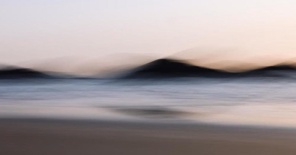 minimal fog horizon landscape photograph - The coast comes alive through Bri Vandyke’s @brivandykephotography lens, where motion, light, and emotion converge. “Through Intentional Camera Movement, I create abstract photographs that capture not only the appearance of the landscape but the sensation of being immersed in it,” she shares.   Her work is part of Create! Magazine’s Lightness of Being virtual exhibition, inviting viewers to experience the calm and clarity of the Pacific Northwest coast in every image. Explore more of her medi...
