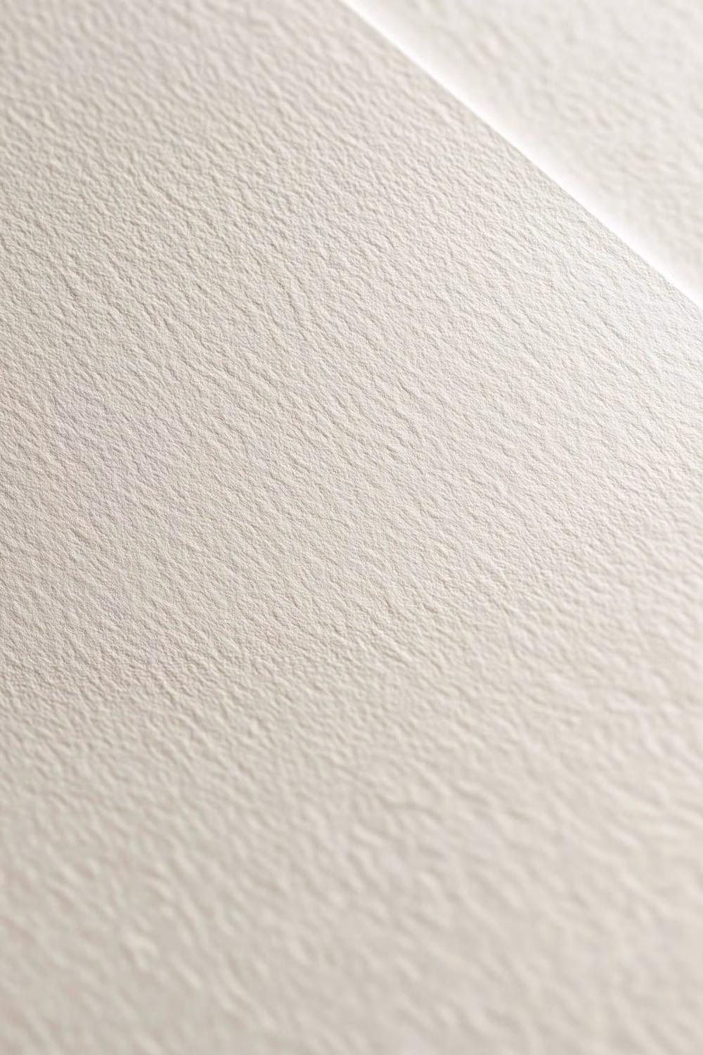 white embossed paper relief macro photograph -