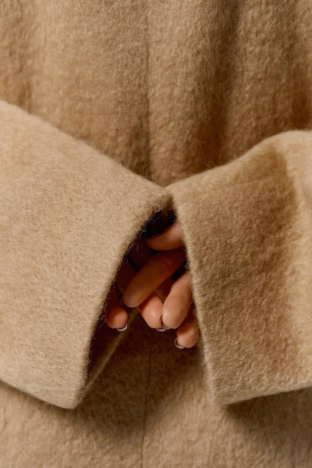 tailored neutral wool coat detail photograph - 