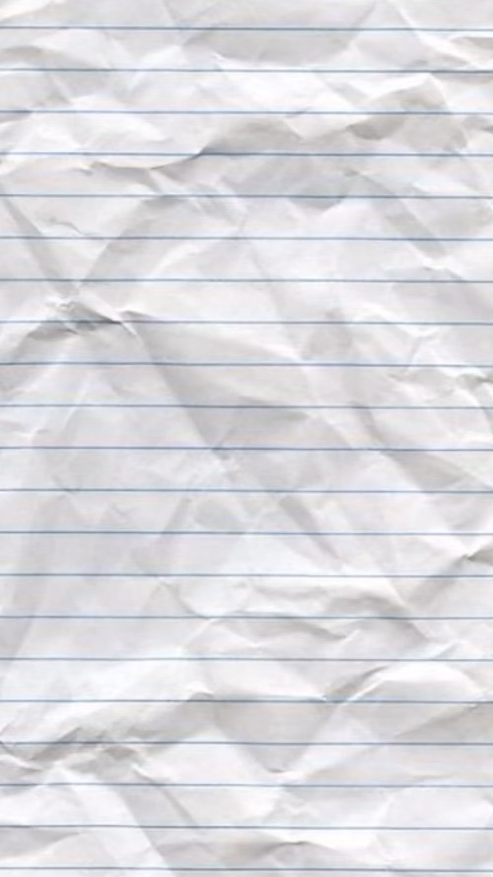 ruled notebook paper fibers close up -