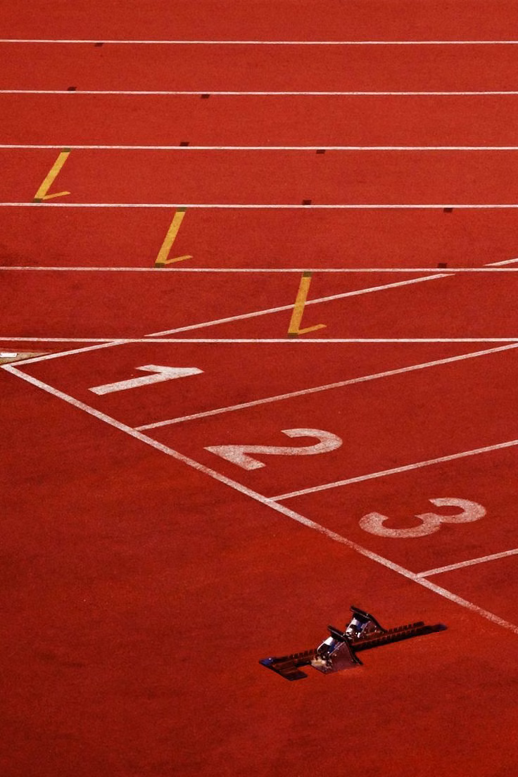 red rubber running track texture close up -