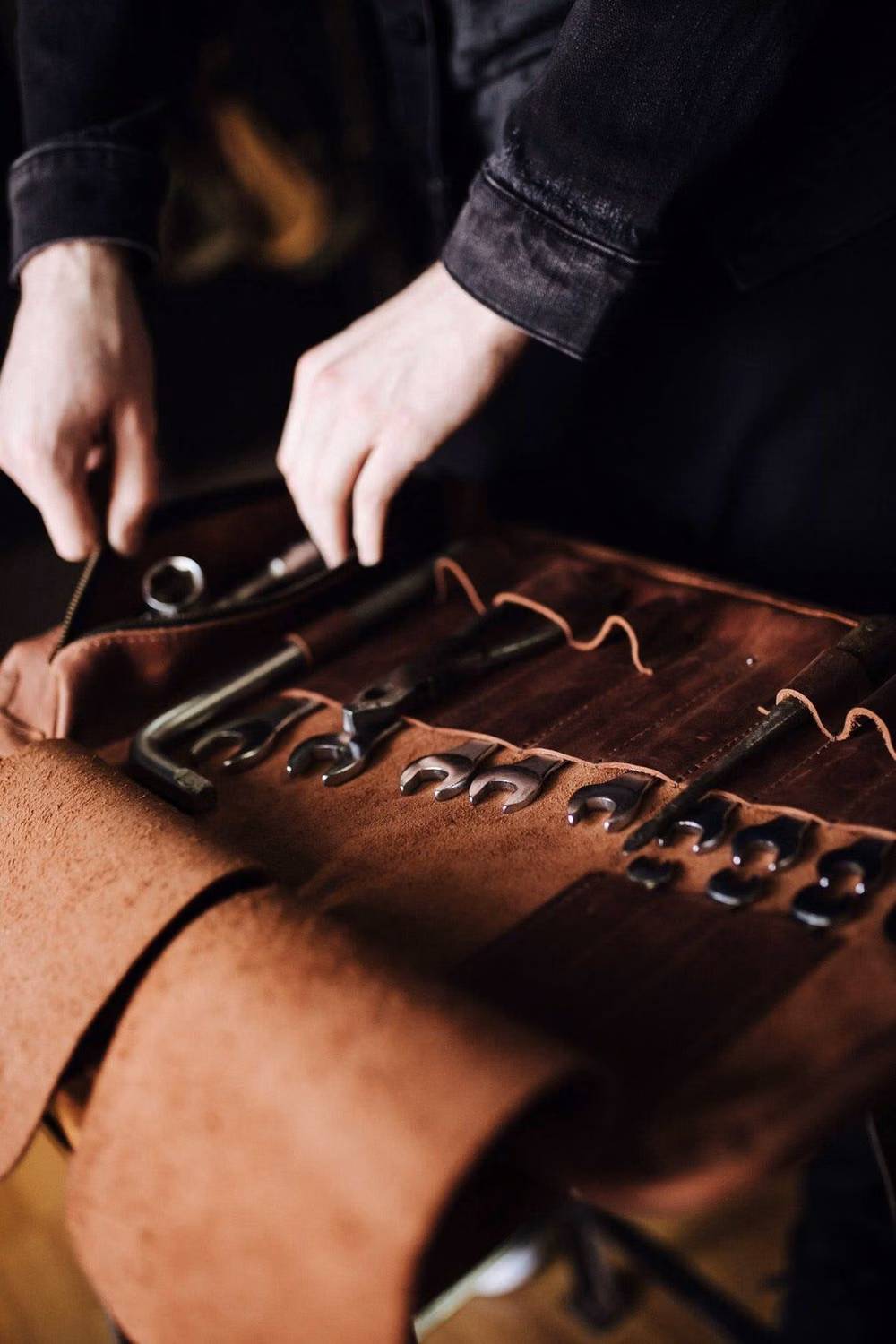 vintage leather tool roll photograph -