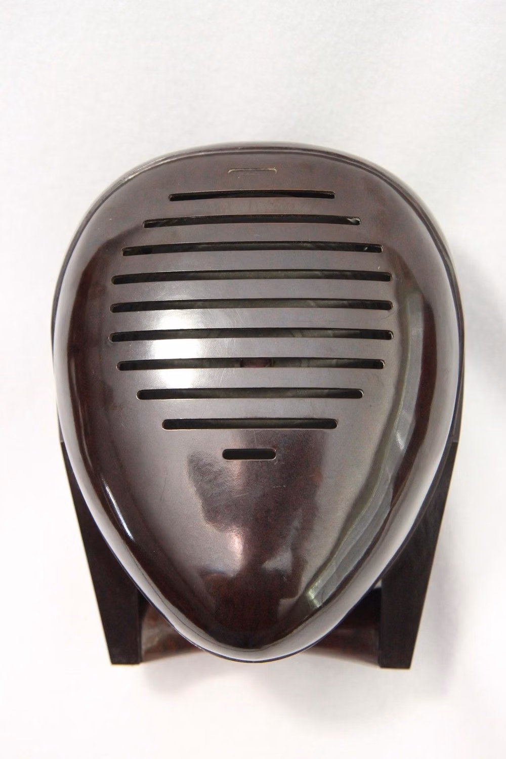 rounded Bakelite radio product photograph - Zenith, radio nurse in bakelite, designed by Isamu Noguchi