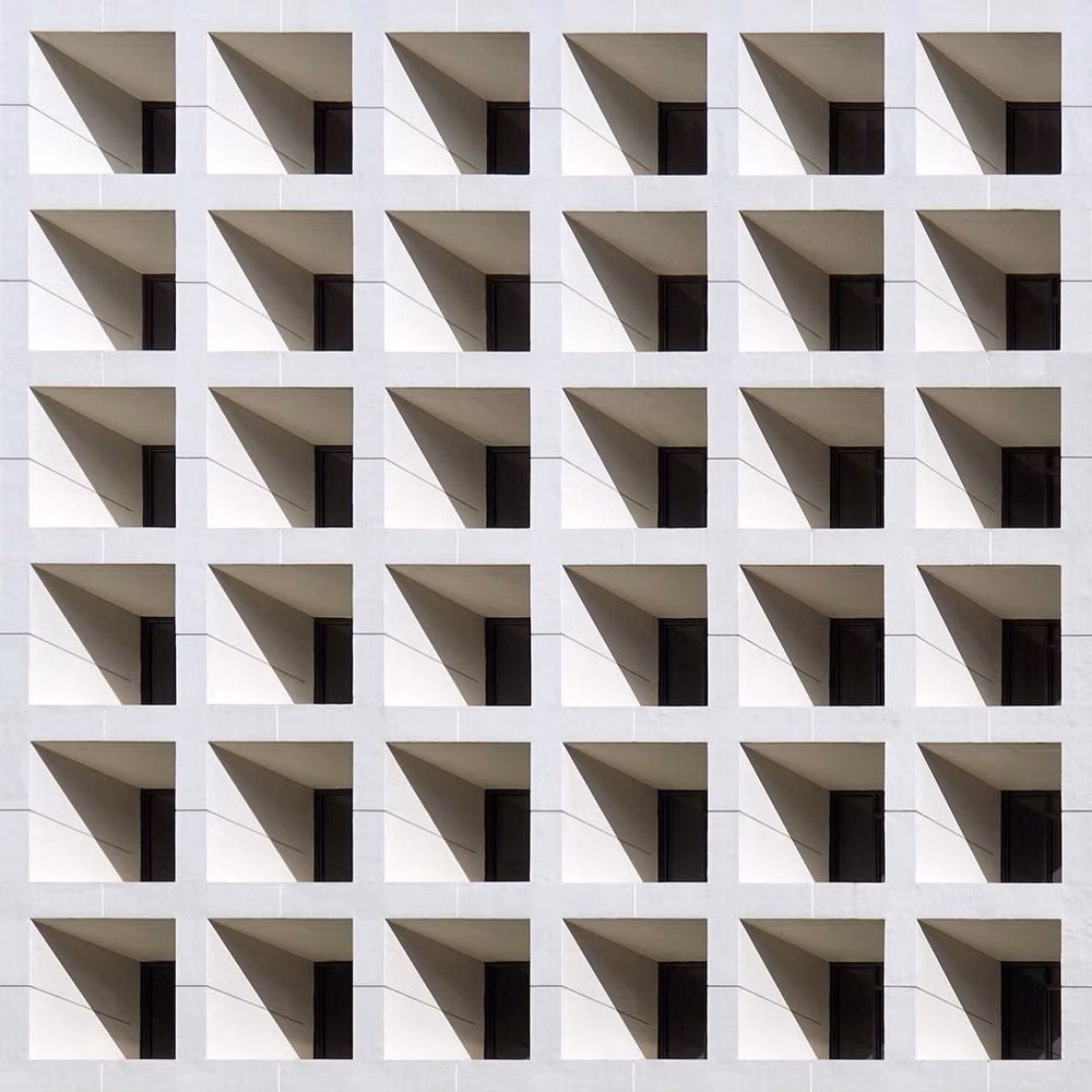 Swiss modernist concrete facade grid photograph - 2017 Retrospective (2 of 7) - Getting boxed up in Hong Kong 🎁 . #architecture #archilovers #modernarchitecture #architecturelovers #architexture #minimal #minimalist #minimalism #minimal_lookup #architecture_view #tv_buildings #tv_pointofview #tv_leadinglines #lookingup_architecture #lookup #arkiminimal #arkiromantix #archi_features #1_unlimited #geometry #abstract #facade #facadelovers #windows #grid #concrete #discoverhongkong #hongkong #香港 #建築