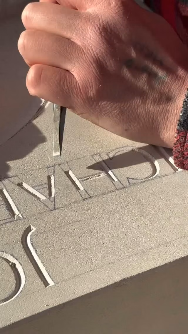 carved stone inscription letters close up - Maker Spotlight: @joseph_hayton   Chiseling stories one letter at a time. Watch as Joseph carves into Portland limestone with precision and patience—each cut revealing the quiet craft of stone lettering.  #stonecarving #lettering #craftsmanship #carvingstone #stonemasonry #asmr #howitsmade